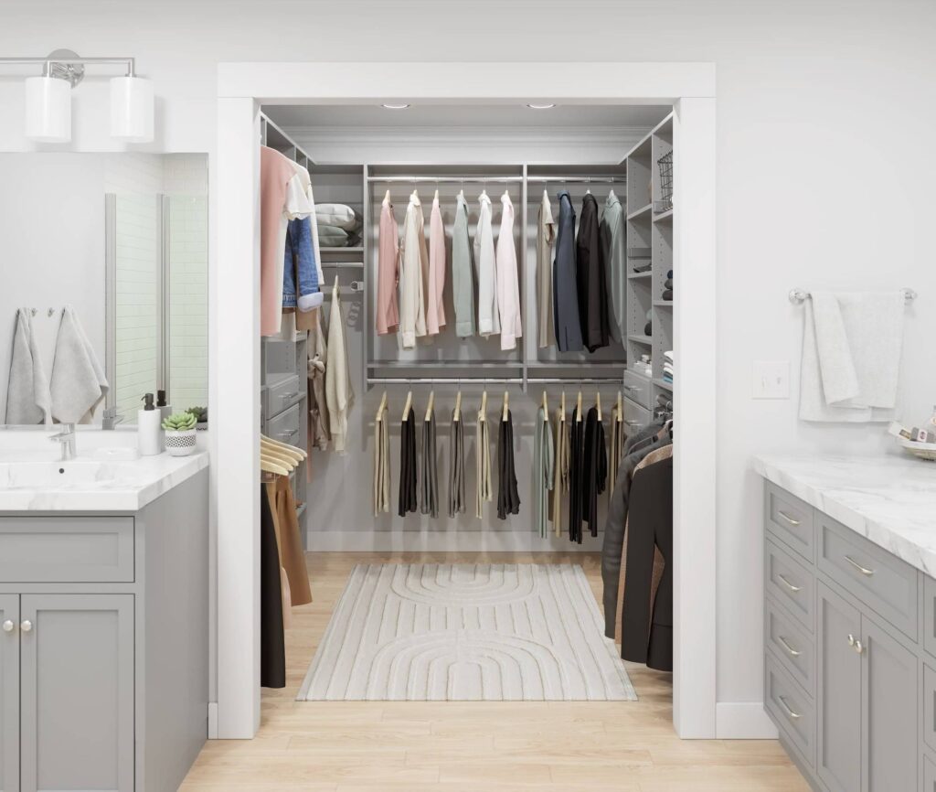 Modern walk-in closet with organized wardrobe and shelves.