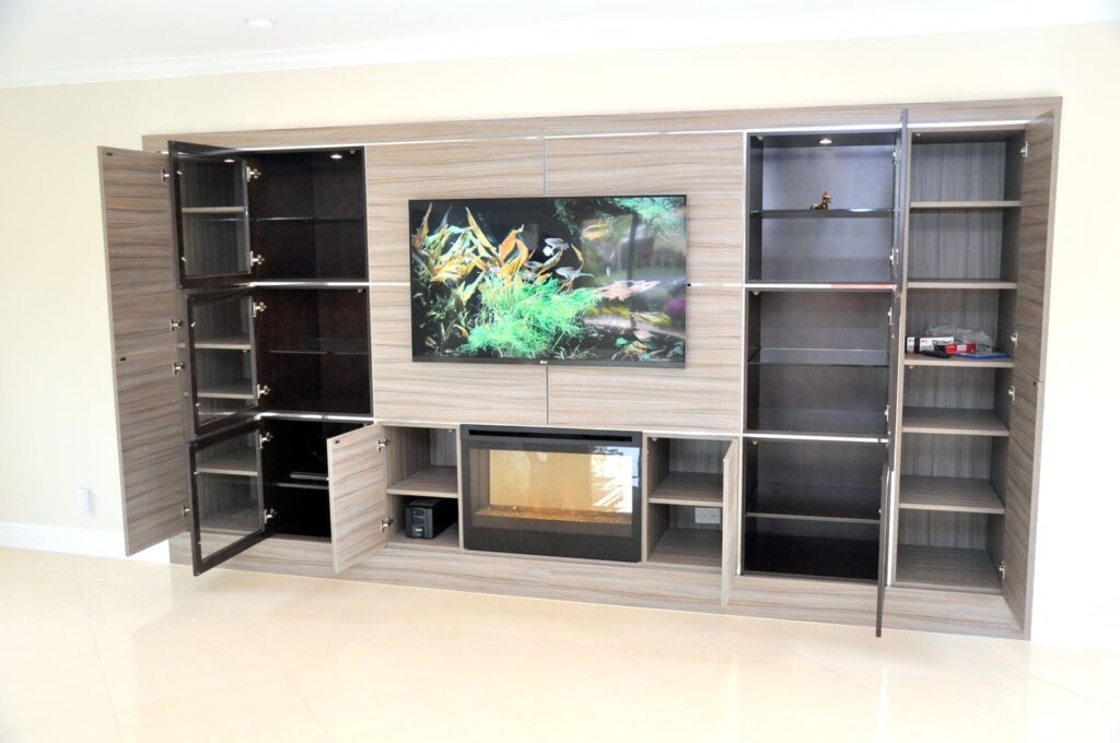 Modern entertainment center with cabinets and fireplace