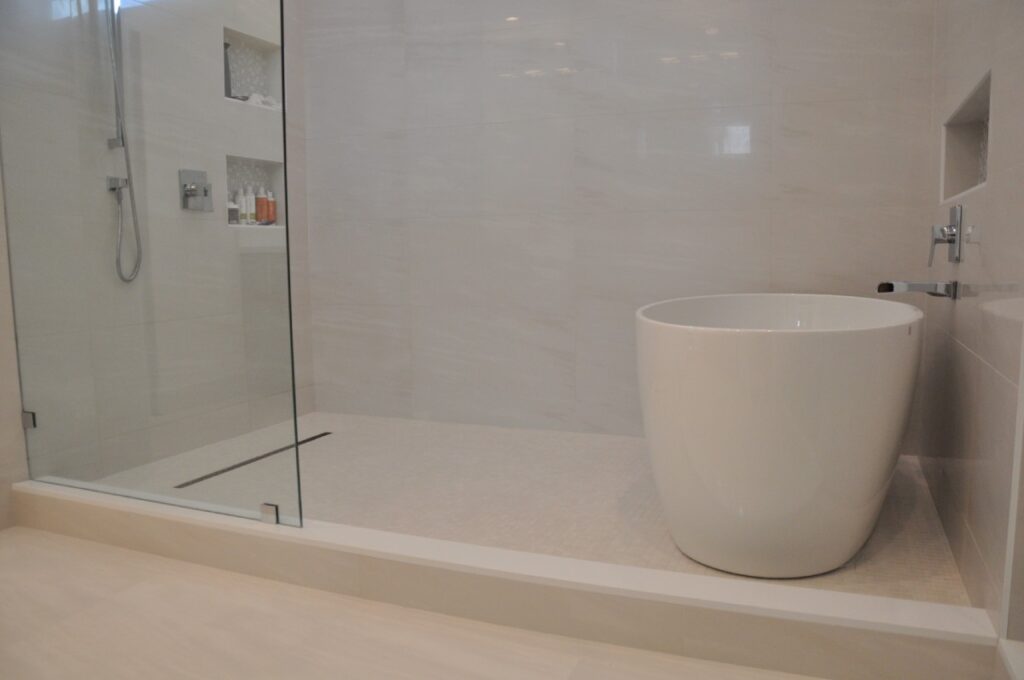 Modern bathroom with freestanding tub and glass shower