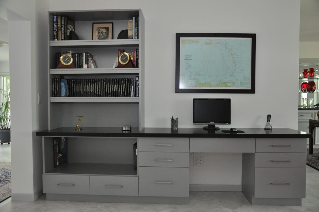 Modern office bookshelf with desk and map