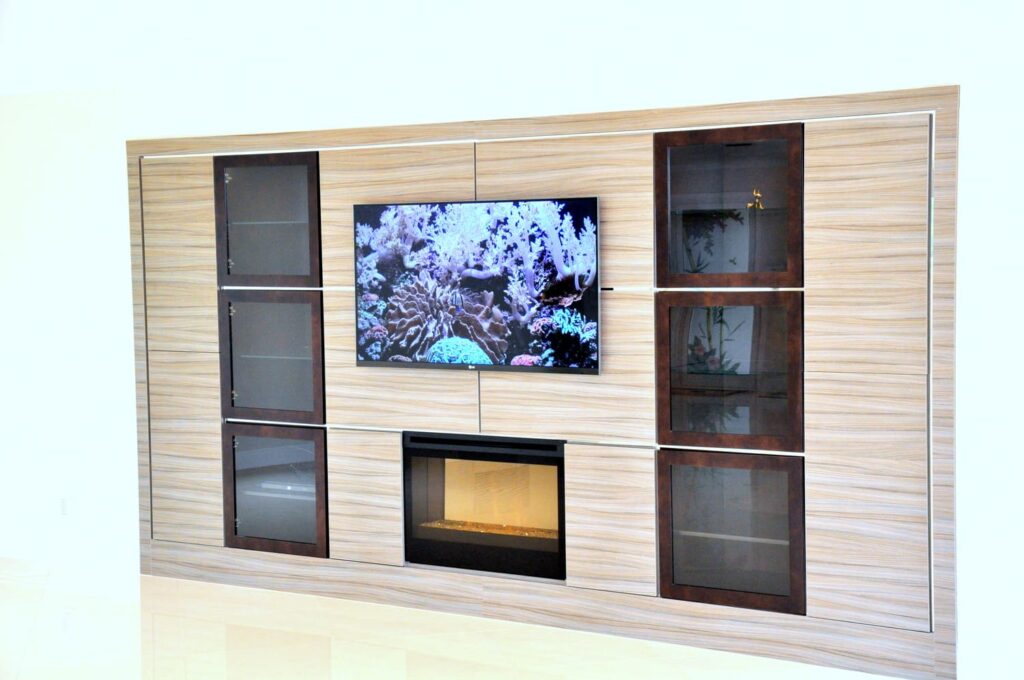 Modern entertainment center with TV and fireplace